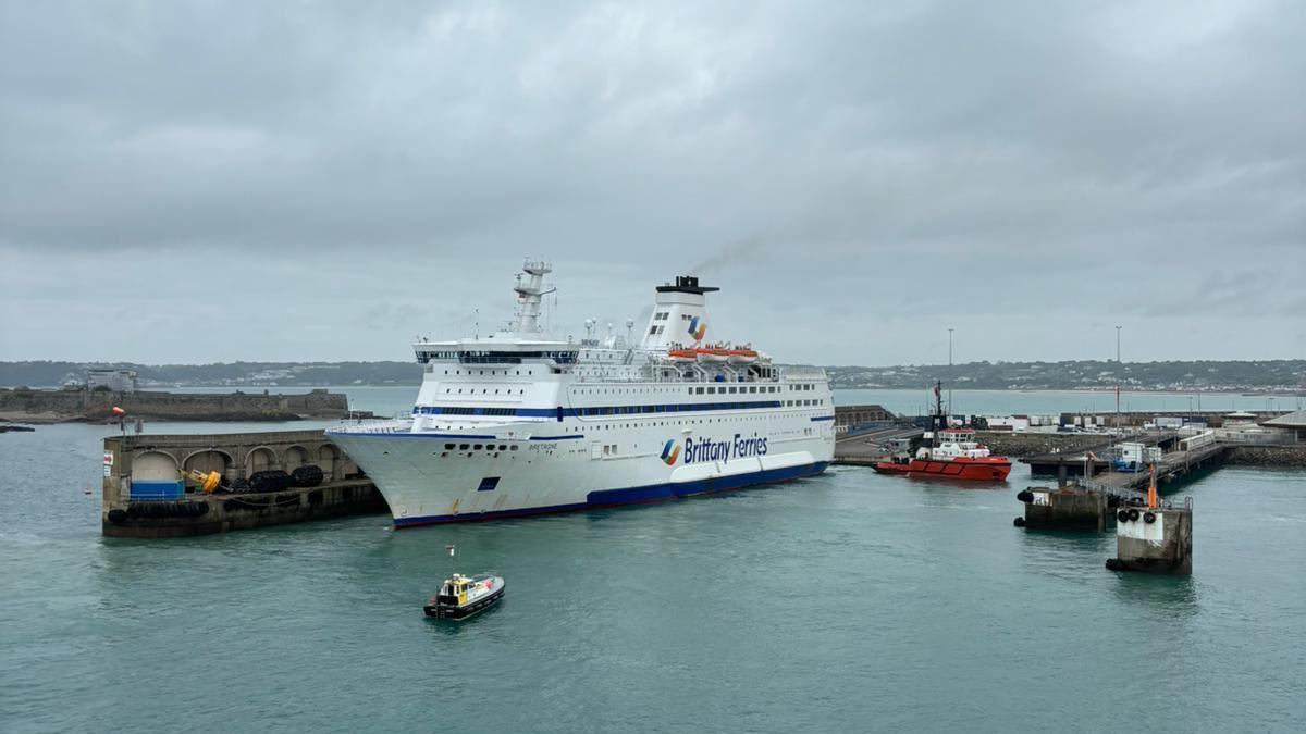 The Bretagne ferry docking at St Helier's harbour, surrounded by two smaller vessels