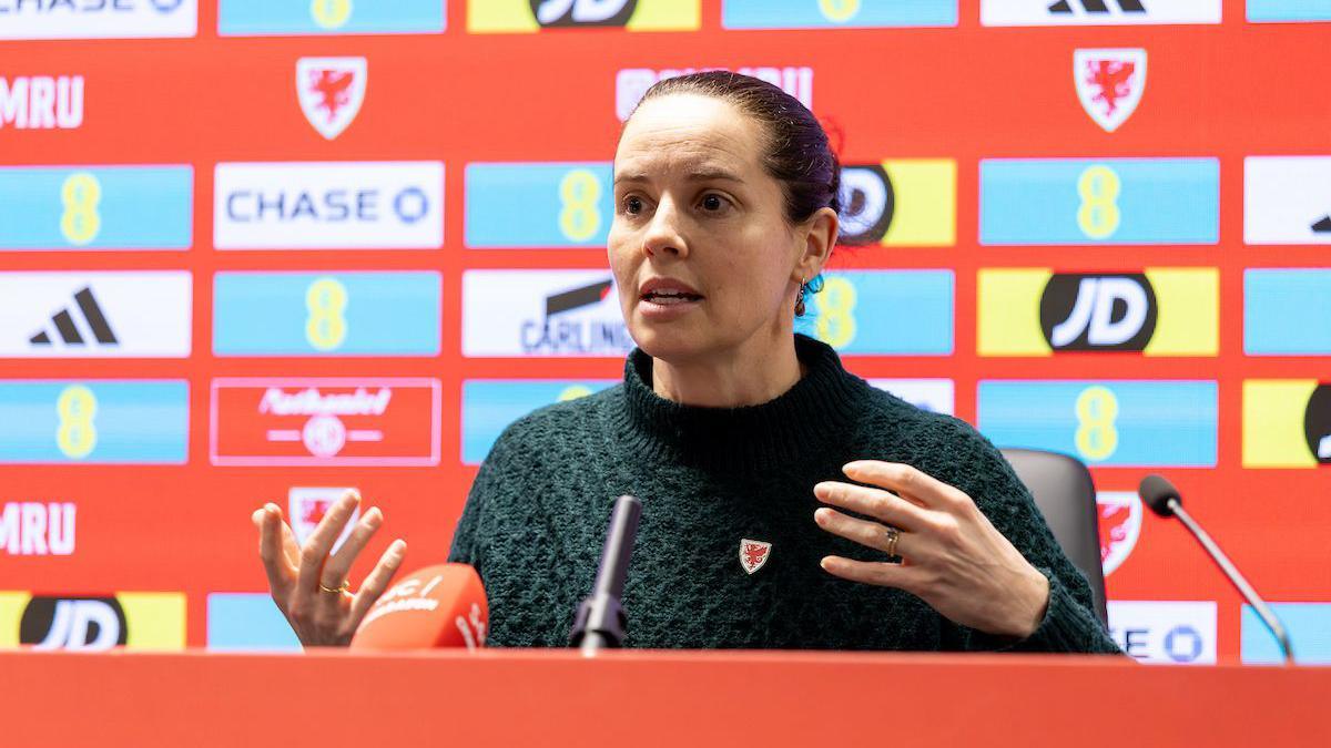 Rhian Wilkinson speaks to the media 