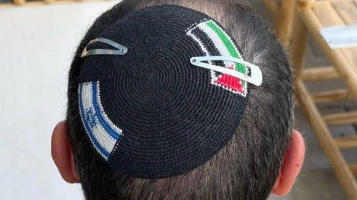 Israeli police cut Palestinian flag from kippah