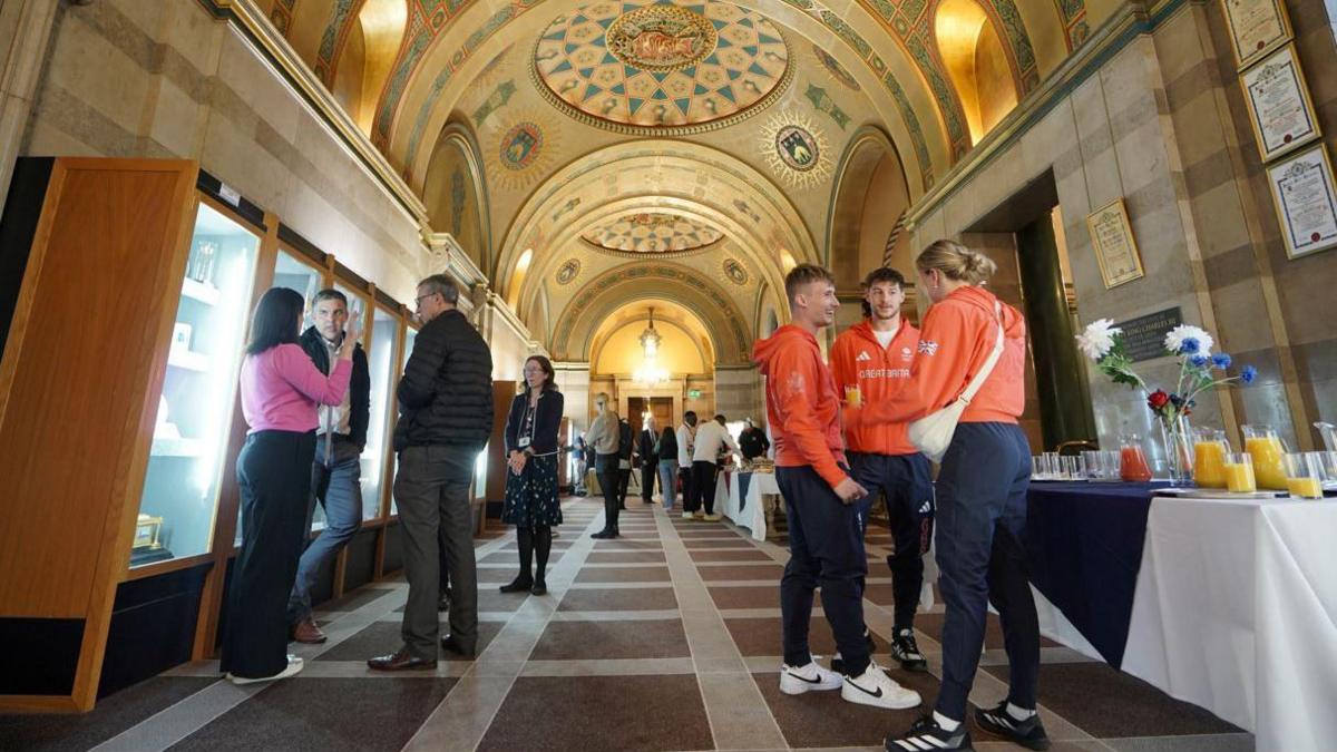 Athletes join the civic reception at the banqueting hall in Leeds Civic Hall 