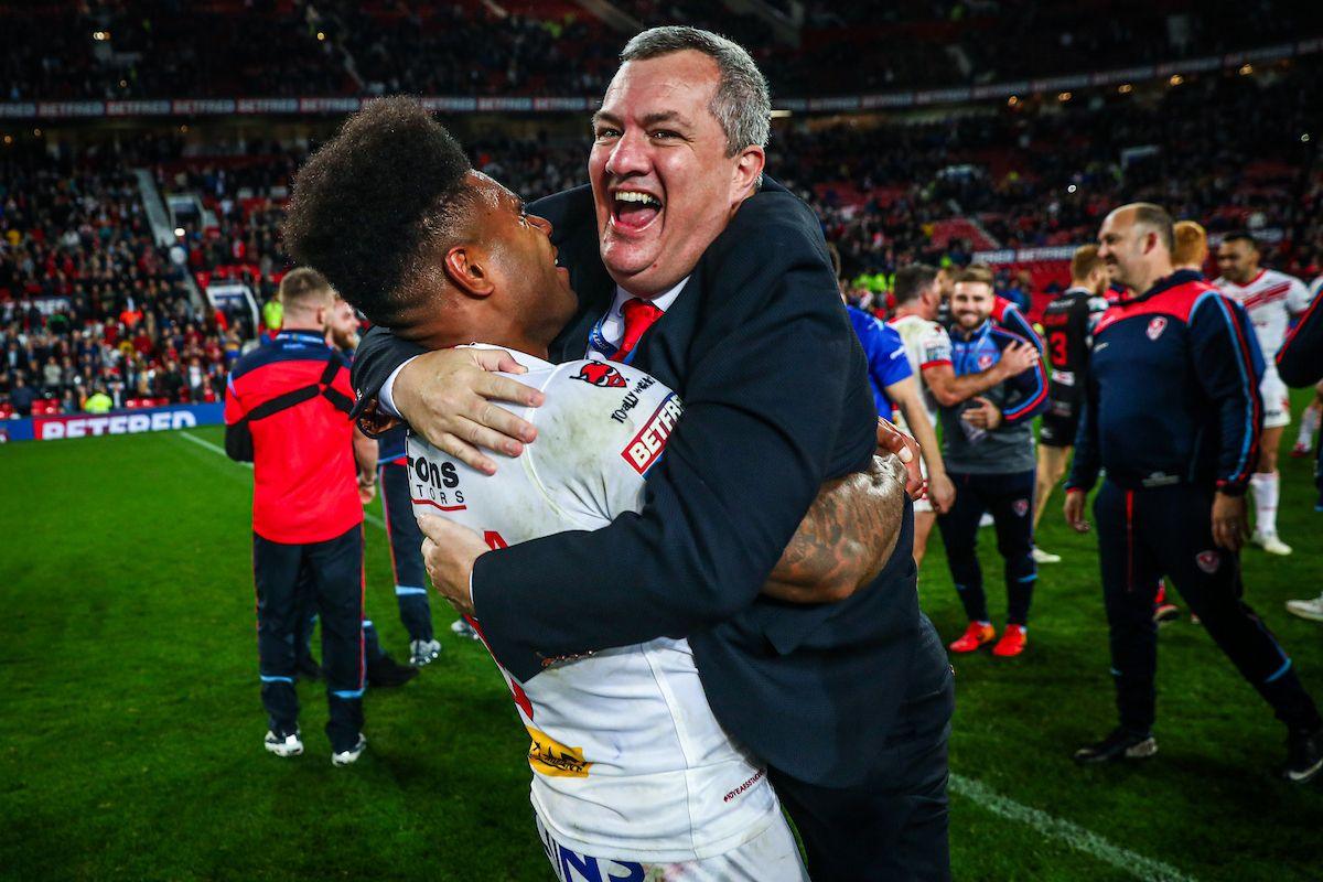 Mike Rush celebrates the 2019 Grand Final win with Kevin Naiqama