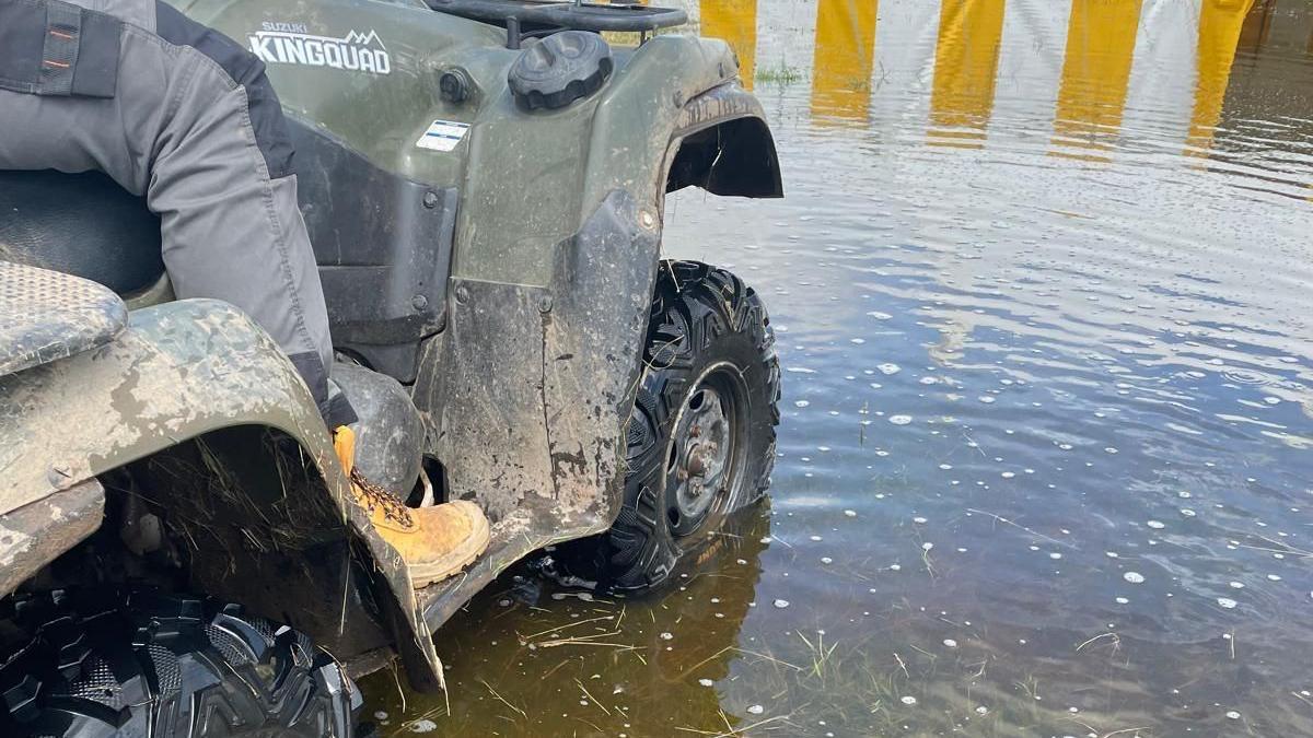 Quad wheel under water at county ground 