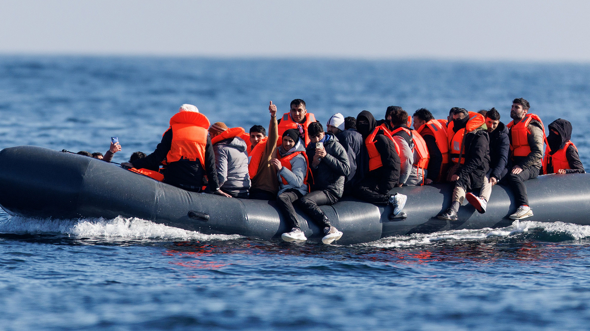 People crossing the English Channel on a small boat on 6 March