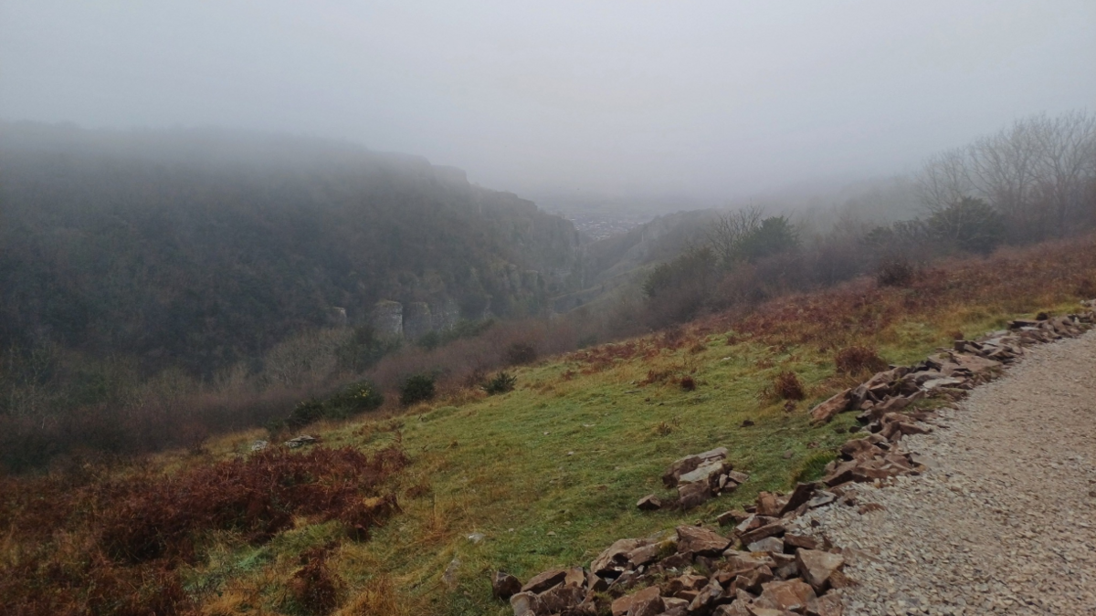 Path on the northern side of Cheddar Gorge in the Mendip Hills. The photo has been taken on a very foggy day.