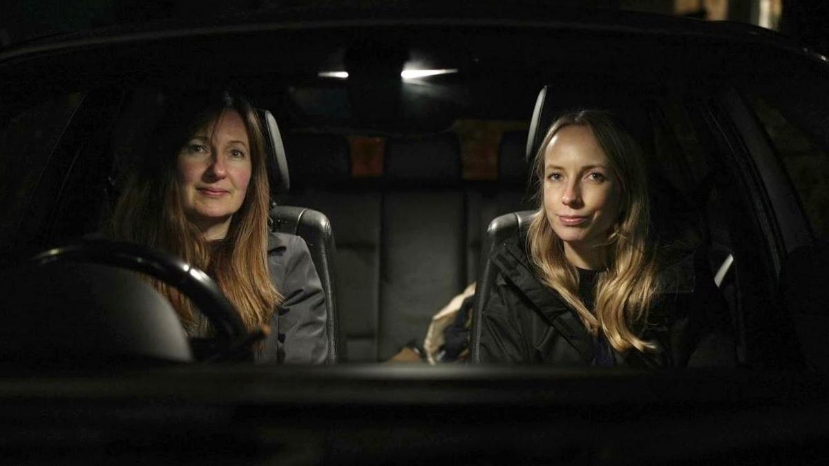 Rose Brown (left) and Jo Ritchie sat in a car looking direct to camera.