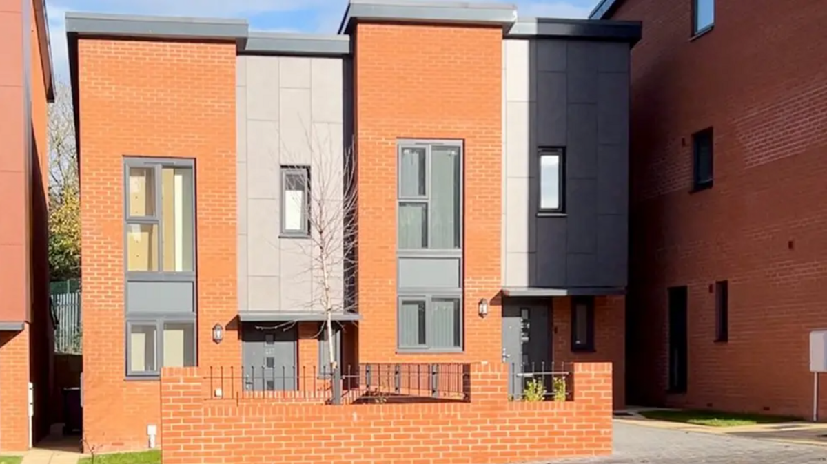 An image of red brick homes known as Heath Town