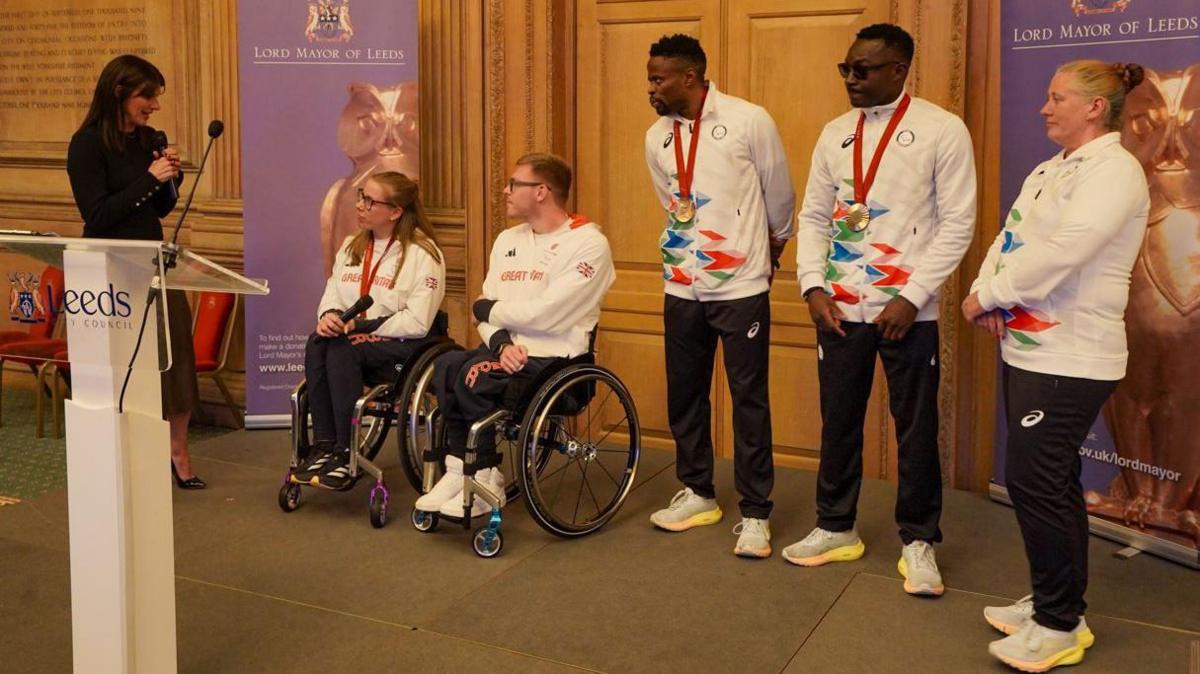 Athletes on stage at the event in Leeds - including wheelchair racers Hannah Cockroft, Nathan Maguire and Guillaume Junior Atangana and Donard Ndim Nyamjua.