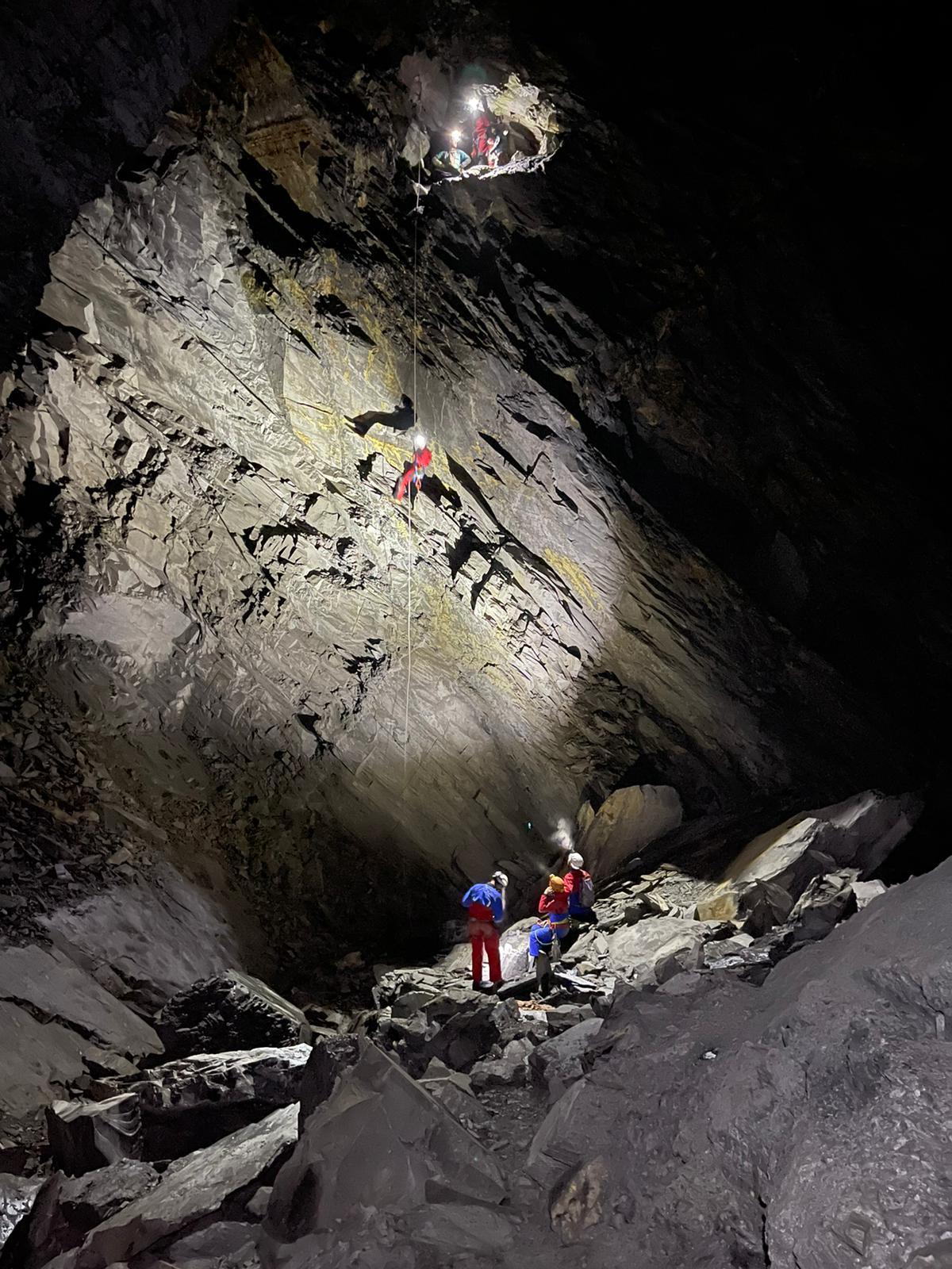 A team in a cave