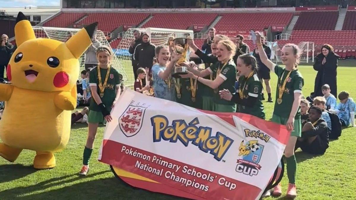 Southborough Primary School lifting the U11 Girls Cup.