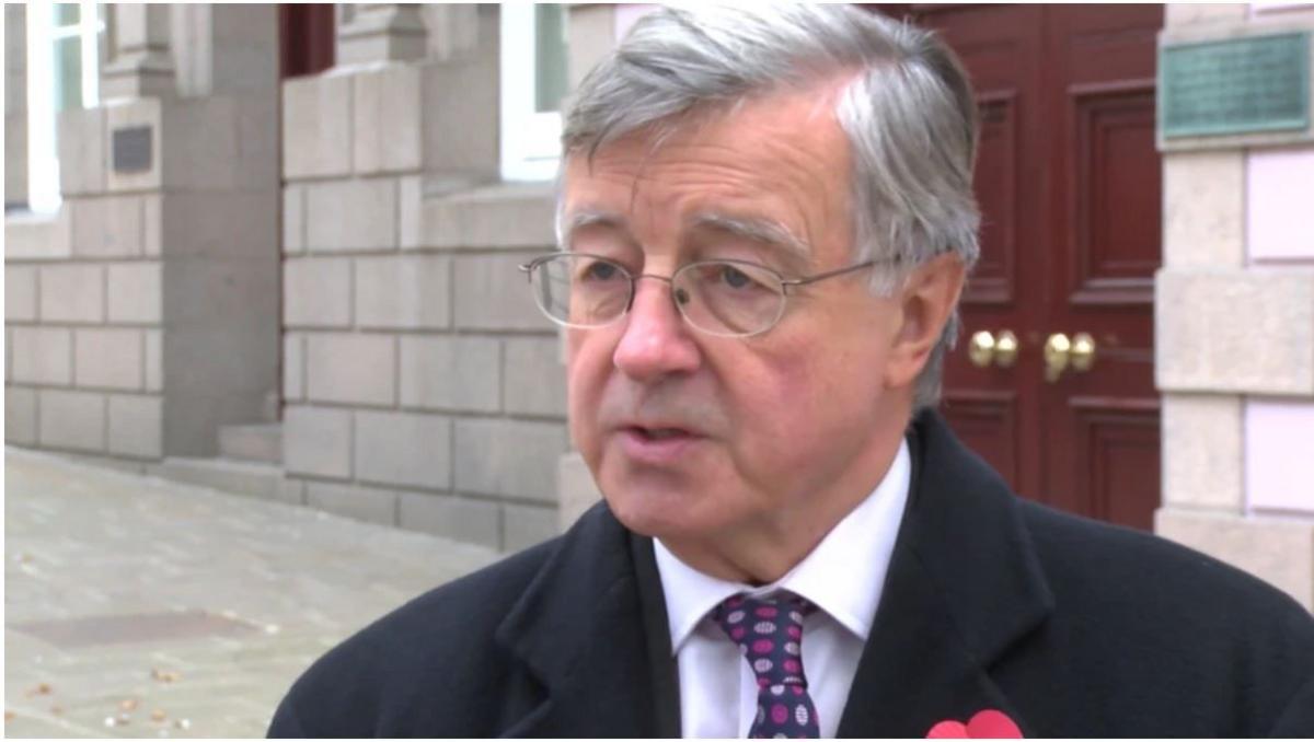 Deputy Sir Philip Bailhache standing outside the States of Jersey building.