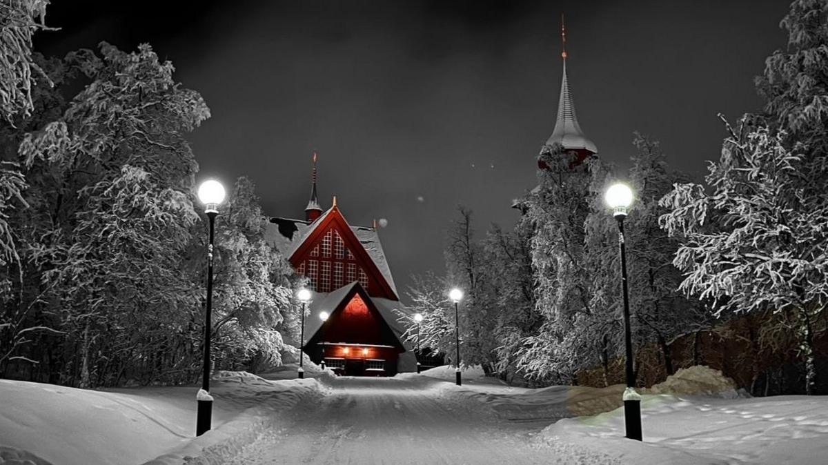 Kiruna church at night in the snow