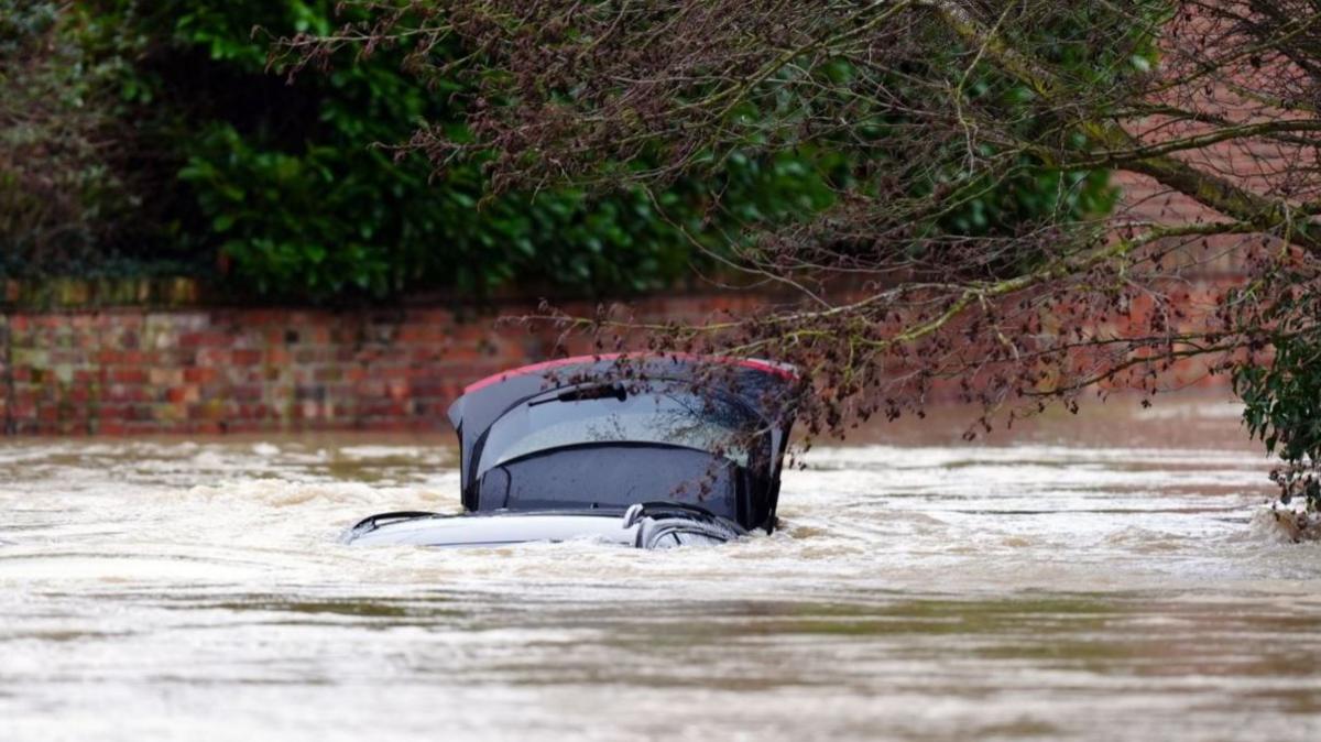 Car submerged in floodwater in Leicestershire