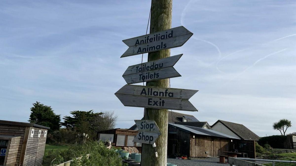 Signs at Tŷ Bugail campsite on Anglsey