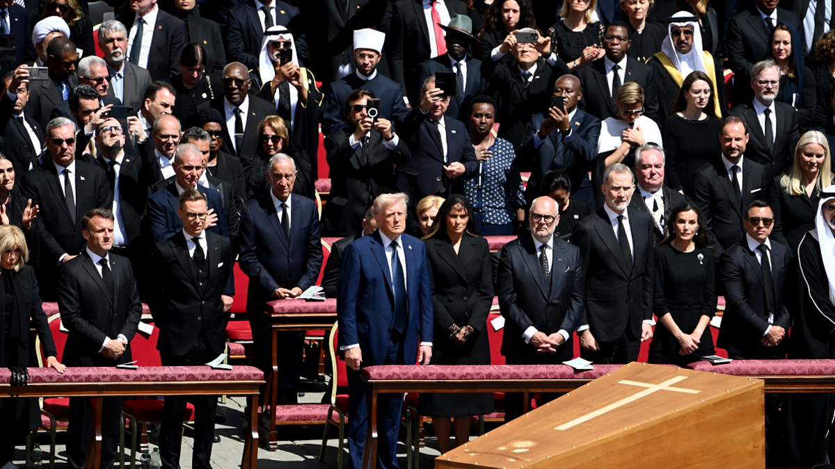 French President's wife Brigitte Macron, France's President Emmanuel Macron, Finland's President Alexander Stubb, US President Donald Trump and his wife Melania Trump, Estonia's President Alar Karis, Spain's King Felipe VI ans his wife Spain's Queen Letizia observe the coffin of late Pope Francis during the funeral ceremony at St Peter's Square in The Vatican on April 26, 2025.