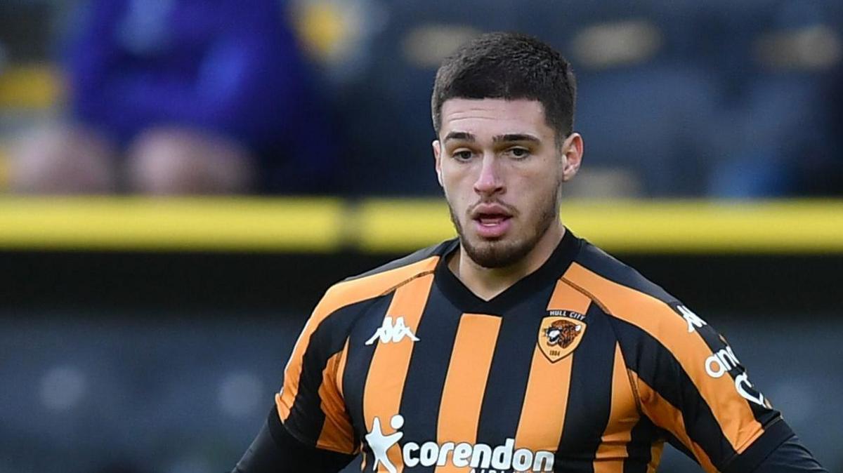 Xavier Simons in action for Hull City against Swansea City last season