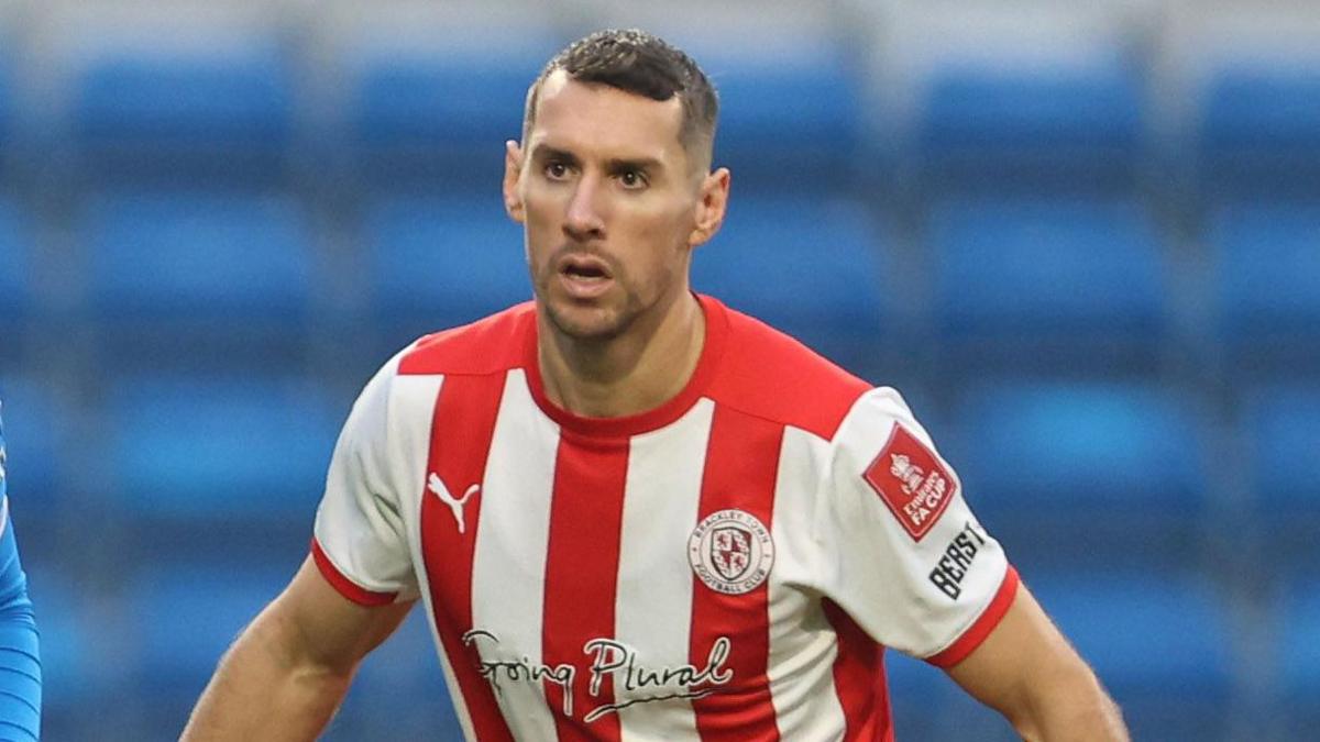 Matt Lowe playing for Brackley Town