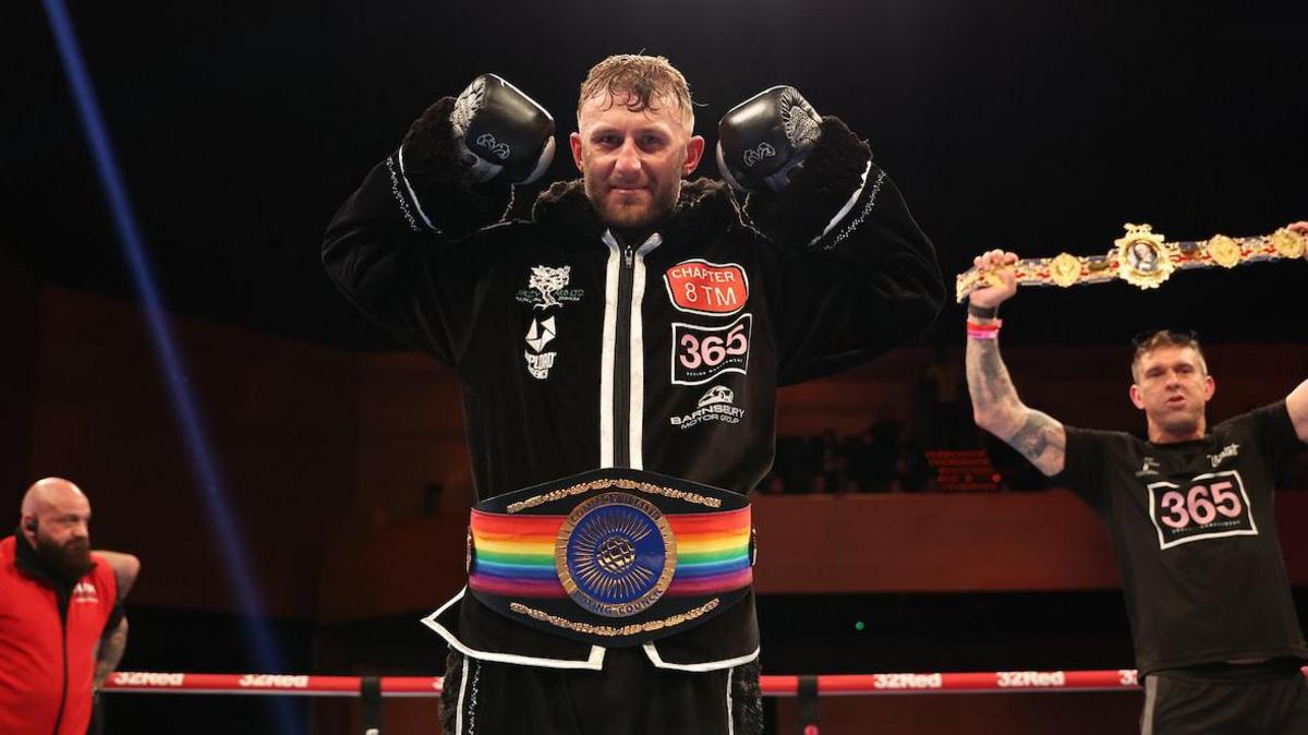 Lewis Edmondson poses after retaining his Commonwealth title 