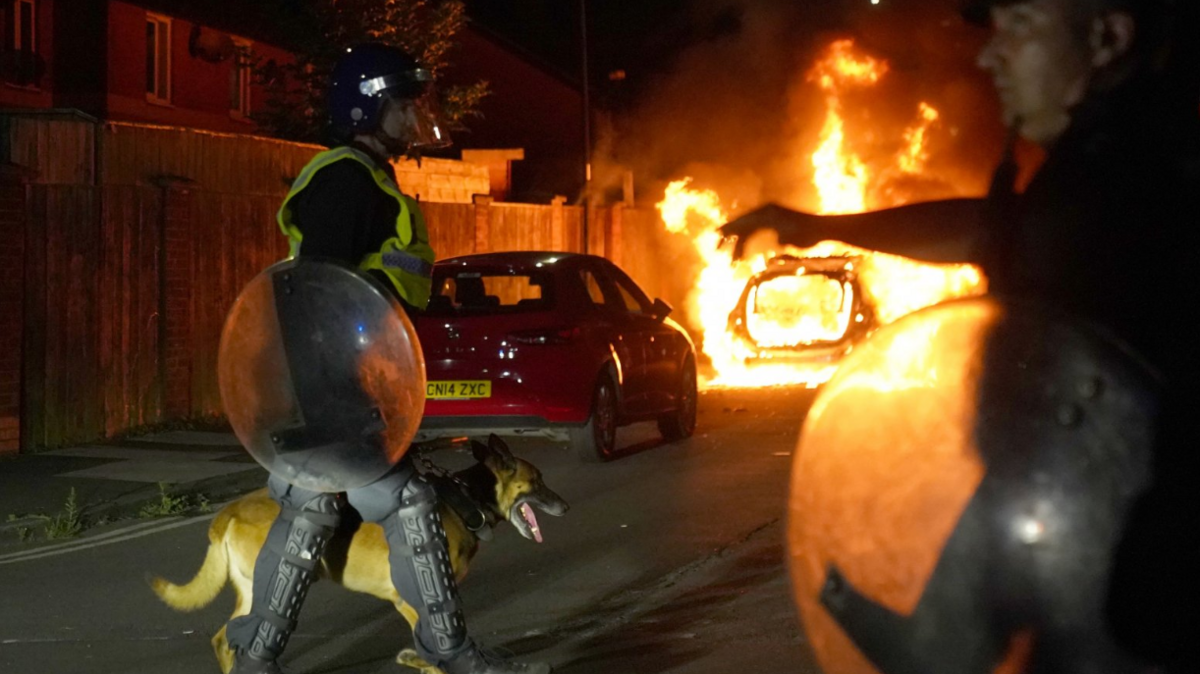 Car burns as officers are deployed on the streets of Hartlepool following a violent protest