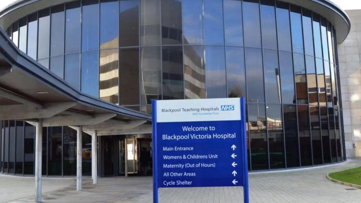 Front entrance of Blackpool Victoria Hospital showing the sign which reads: 'Welcome to Blackpool Victoria Hospital'.