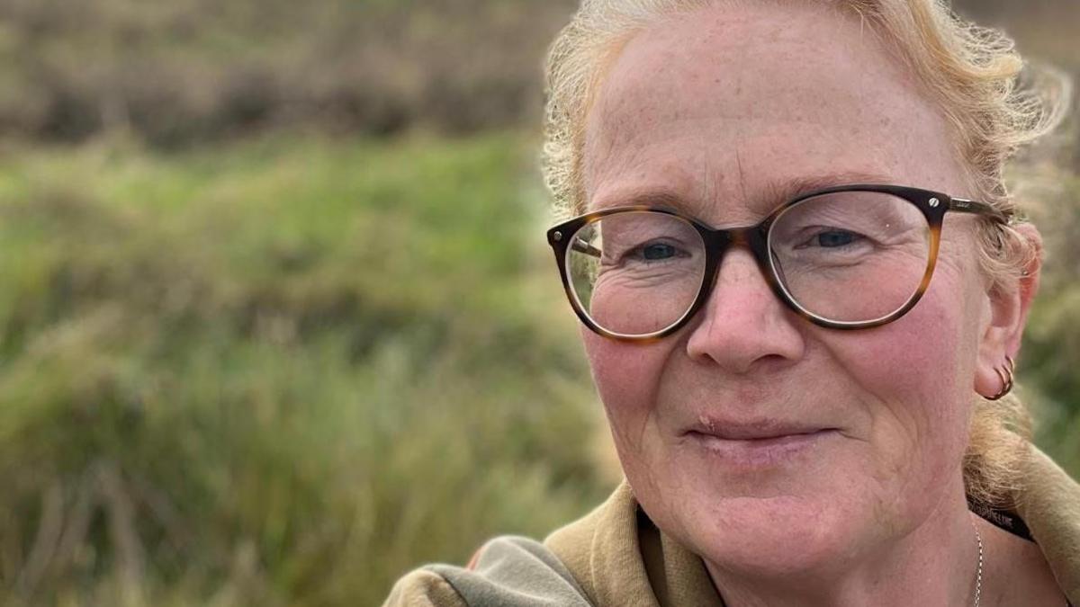 Marguerite Fleming smiles as she looks closely at the camera