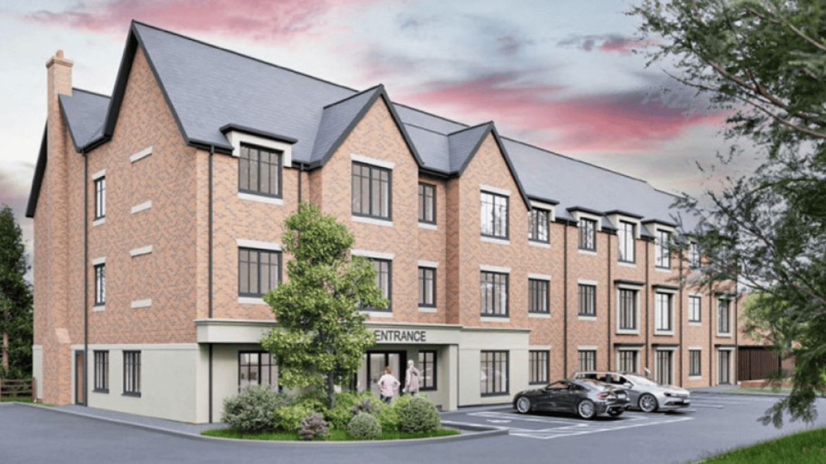 An illustration visualising the new building plans. It depicts a three to four storey building with parking spaces lining the right of the entrance to the building. A small space for greenery, such as a tree and bushes, has been allocated to the left of the entrance.