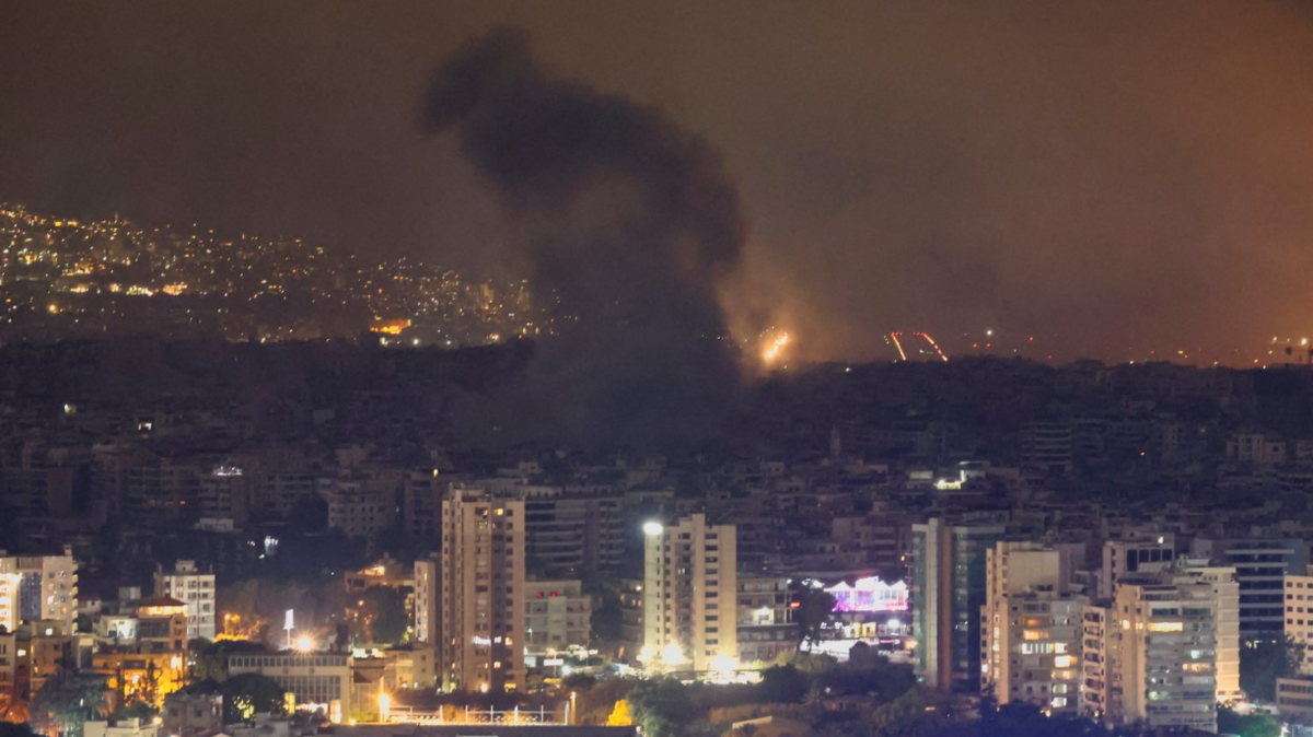 Smoke billows over Beirut southern suburbs after a strike, amid the ongoing hostilities between Hezbollah and Israeli forces, as seen from Sin El Fil