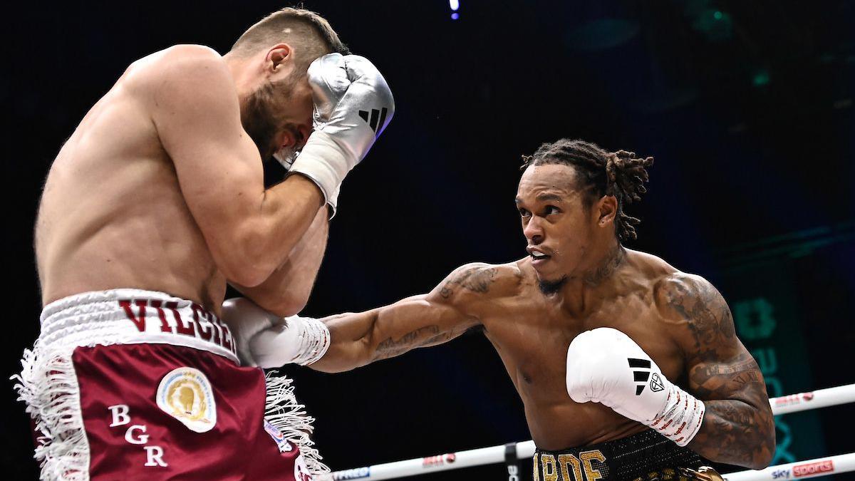 Anthony Yarde throws a body shot against Ralfs Vilcans