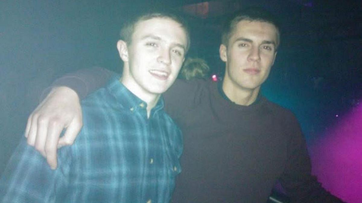 A photo of Joe and Dan together in a nightclub in their twenties.