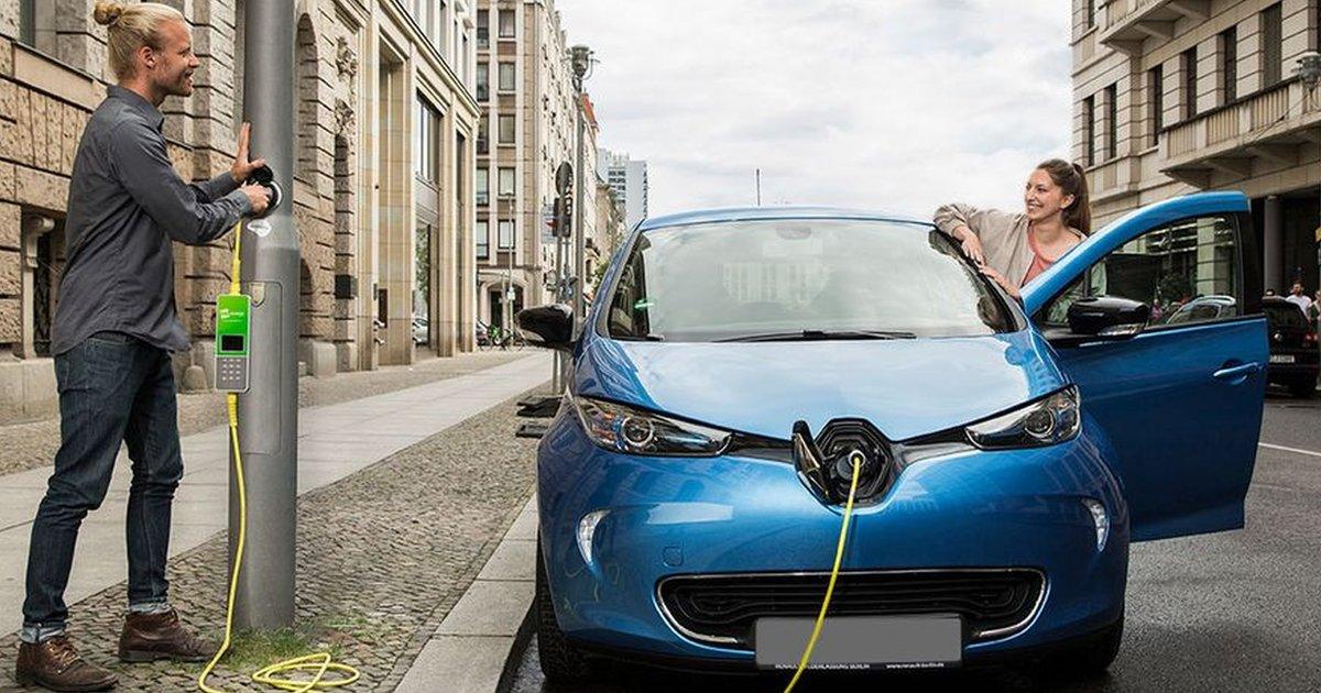 electric car plugged in to lamp-post