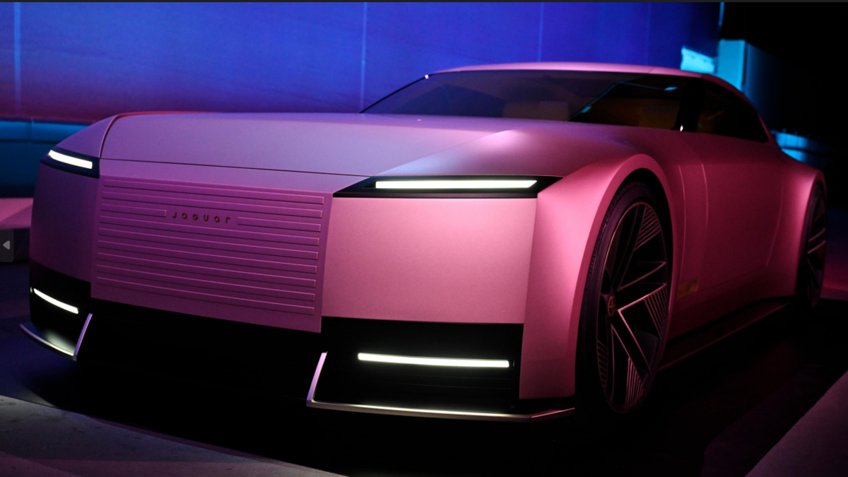 Jaguar's new electric concept car with a big front grille and bonnet, coloured pink