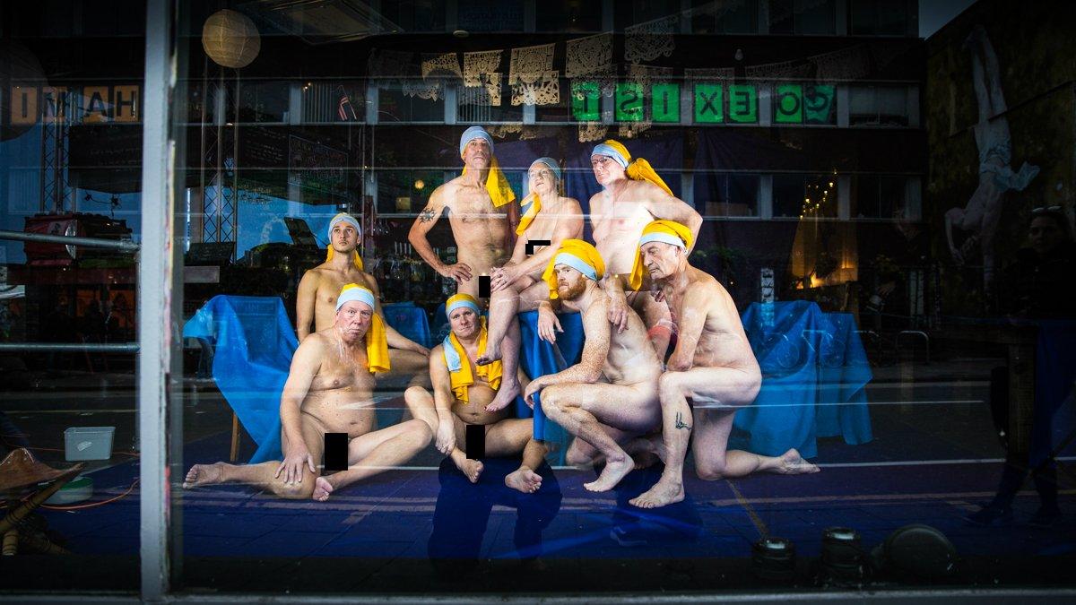 People posed in bar window