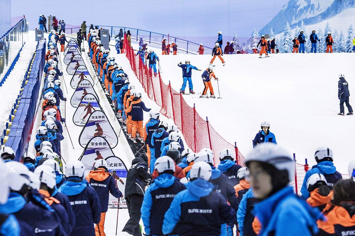 Skiers on the ski lift