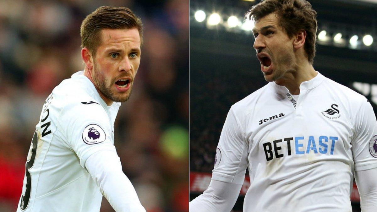 Gylfi Sigurdsson and Fernando Llorente of Swansea City