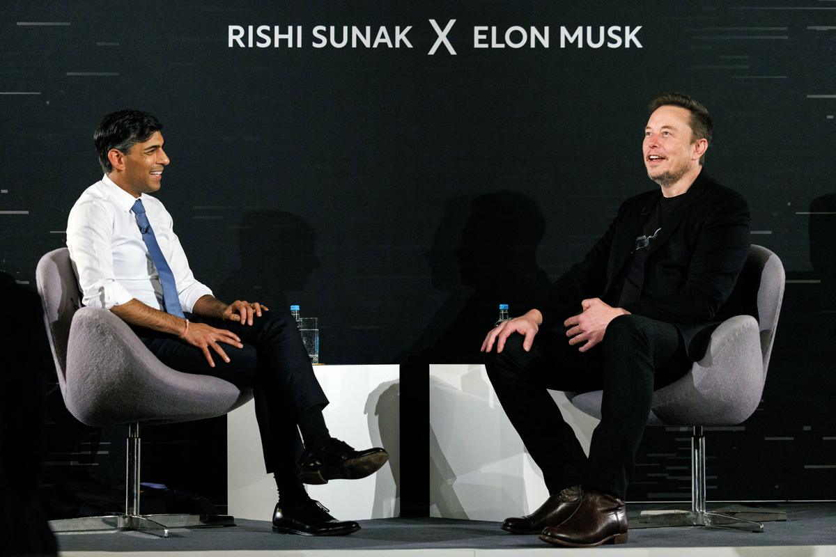 Prime Minister Rishi Sunak and tech entrepreneur Elon Musk on stage in central London, 2 November 2023