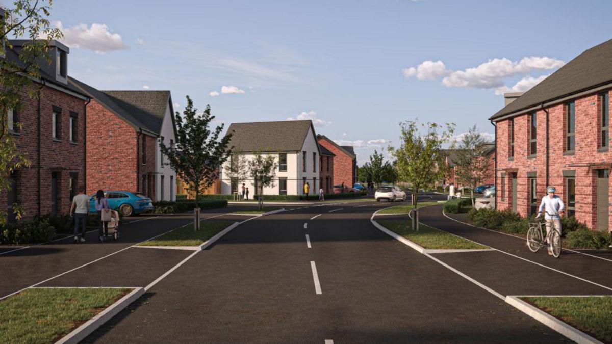 An artist's impression of what homes in the new development could look like. There is a road with houses either side, trees and pavements for people to walk on.