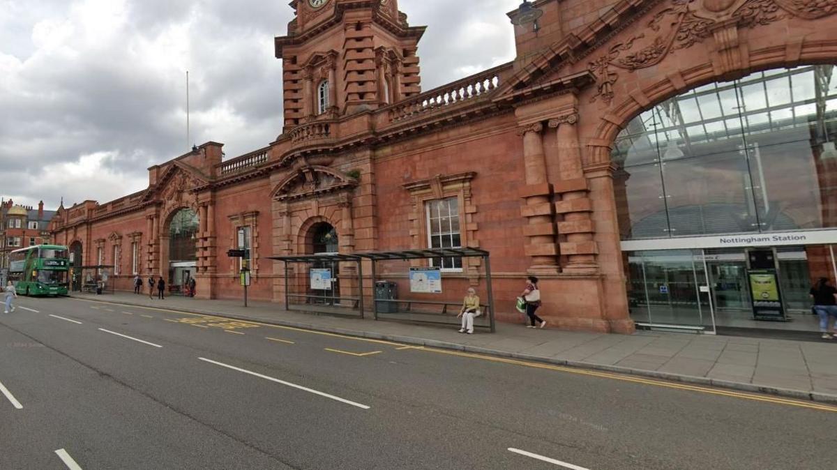 Streetview image of the front of Nottingham station, an ornate Victorian frontage in red terracotta