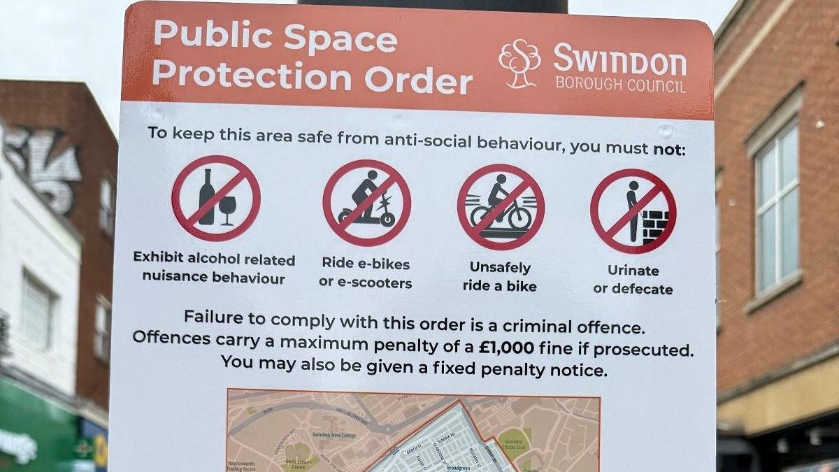 The top of a public sign from Swindon Borough Council notifying people of the Public Space Protection Order. It has a list of prohibited behaviours with symbols, and a map showing where the order is enforced.
