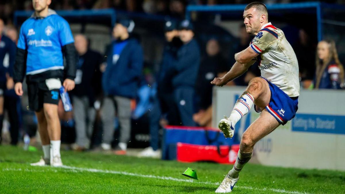 Wakefield's Max Jowitt kicks a conversion against Toulouse.