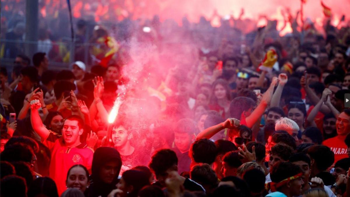 Spain fans in Canary Islands celebrate with flares