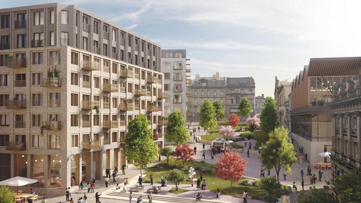 A computer generated view shows a seven storey building on the left. Some of the windows have balconies. There is a paved and landscaped area to the right of the building with people standing or sitting on benches. There are several trees and a table with a parasol. In the background and to the right there are similar buildings.