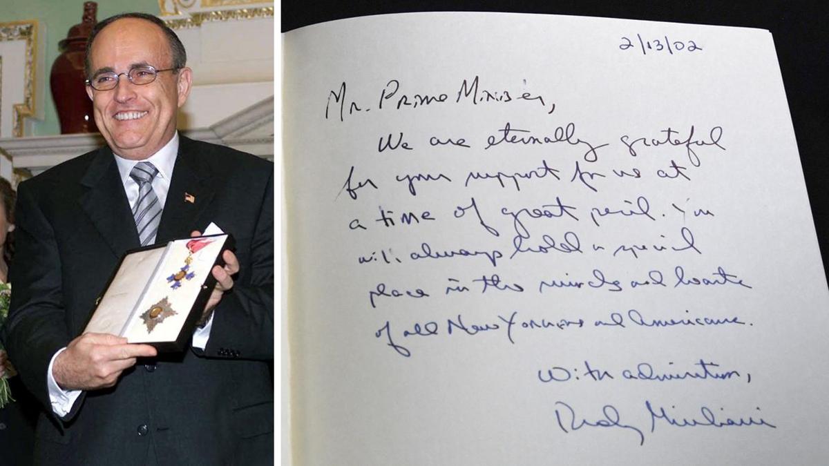 A composite image shows one of the Downing Street books signed by Rudy Giuliani on the right, and on the left, an image of him on 13 February 2002 smiling while receiving the KBE.