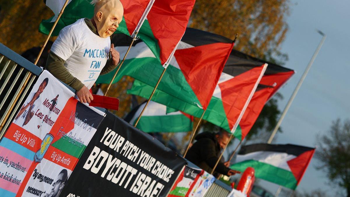 Pro-Palestine supporters display banners and Palestine flags on a bridge above the A38(M) ahead of Aston Villa's UEFA Europa League match against Maccabi Tel Aviv.