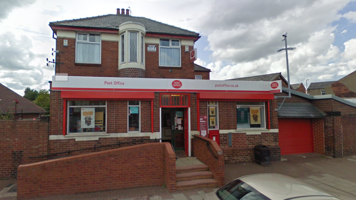 Goldthorpe Post Office, a red-brick building with Post Office signage, and a raised entrance with stairs and a ramp.