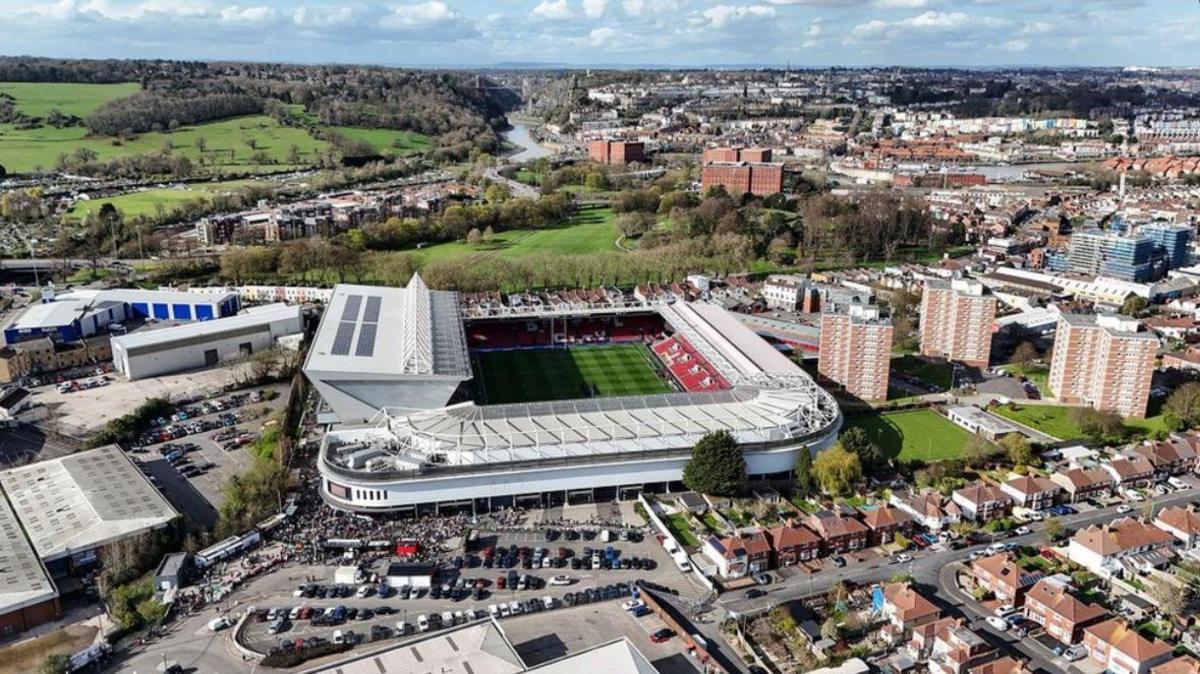 An aerial shot of Ashton Gate Stadium in Bristol with houses in Clifton in the background