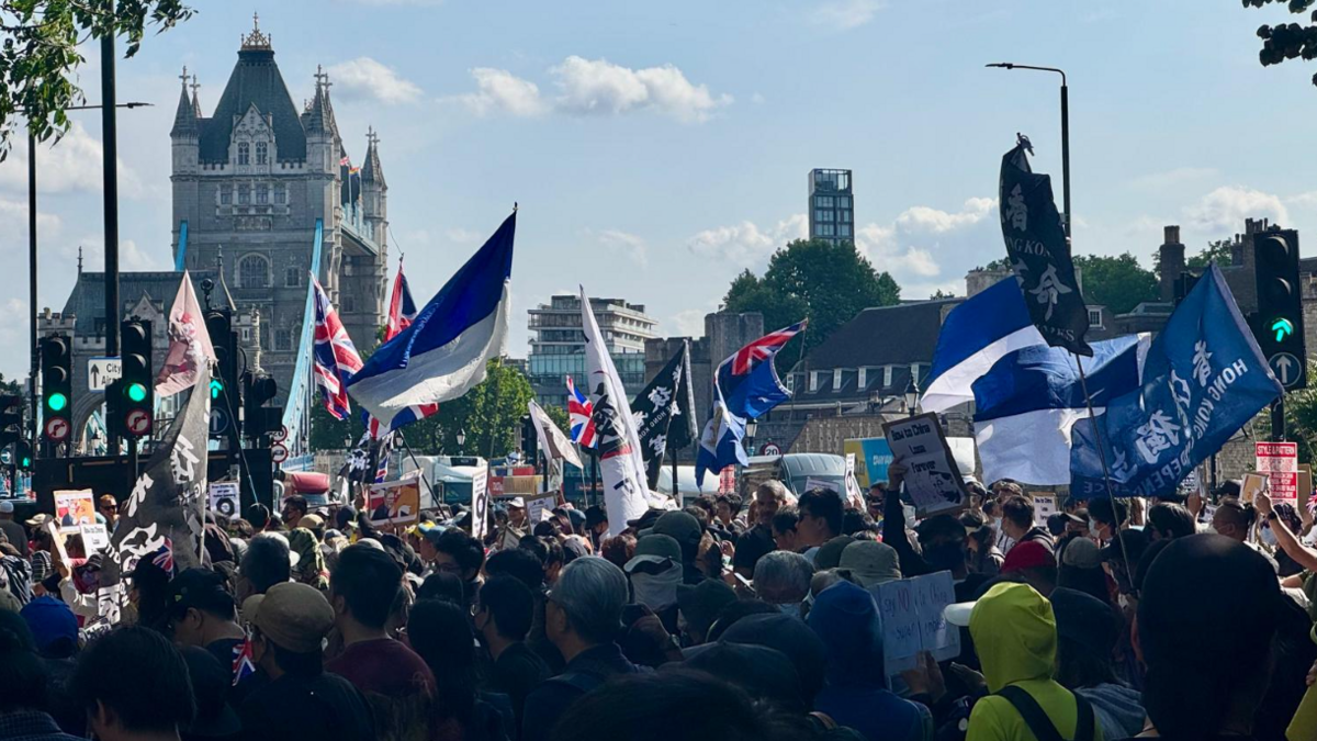 Anti-China mega embassy protesters near the site, at Tower Bridge