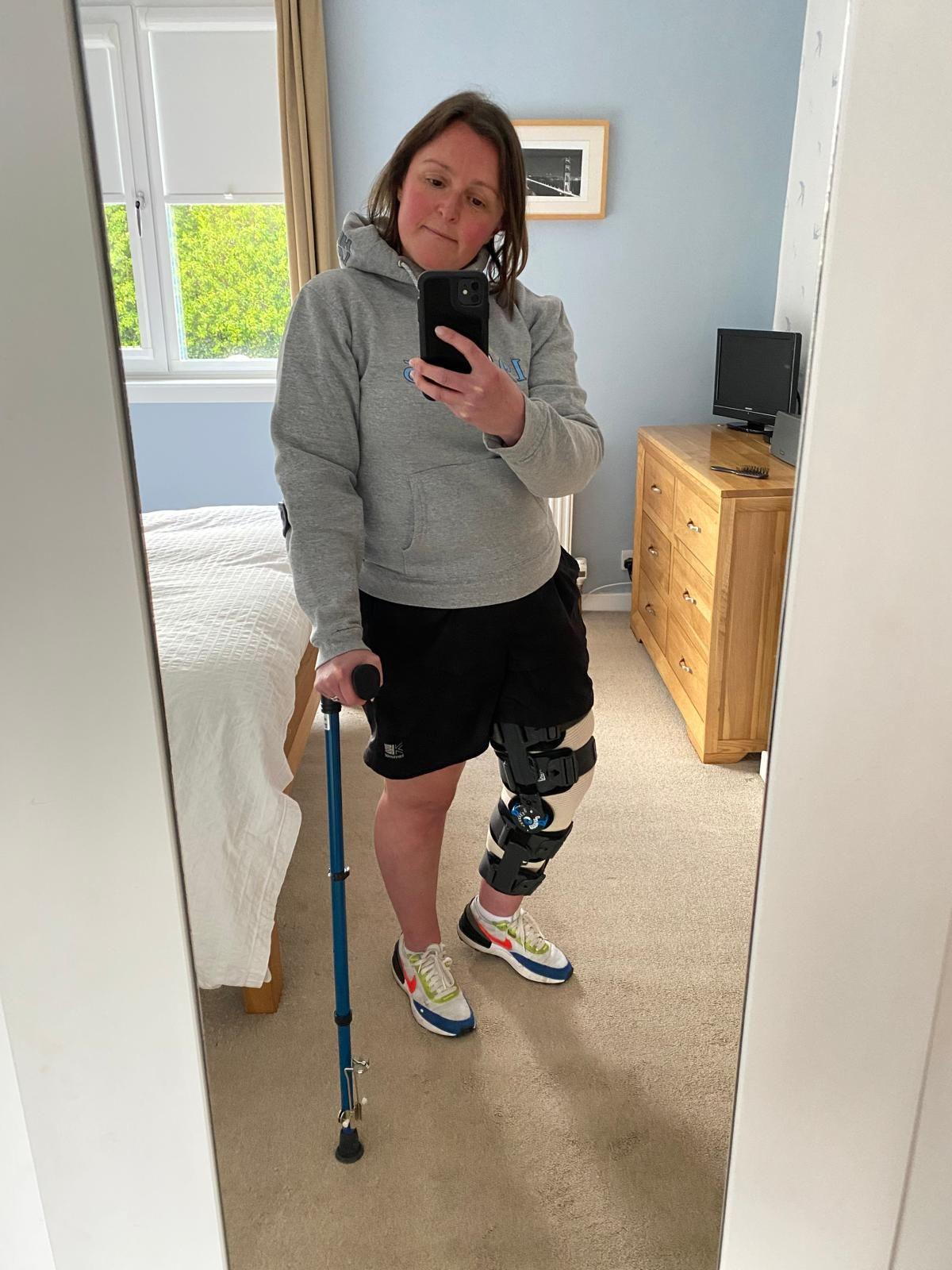 Clare Fallas in her leg brace need for the leg injury 