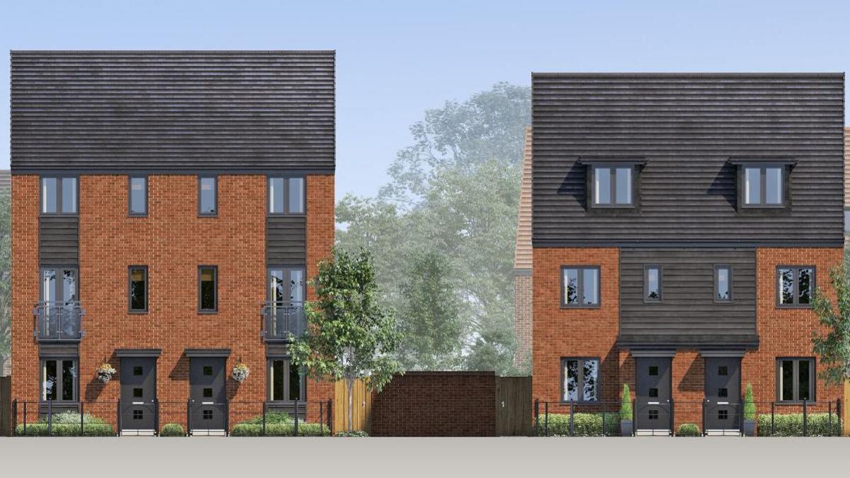 A computer generated image of two sets of three-storey semi-detached new build homes. They are mostly reddy brown brick with grey rooves, windows and doors. There is a gap between them with a wall, which has two wooden garden gates attached, and some trees are visible behind them.