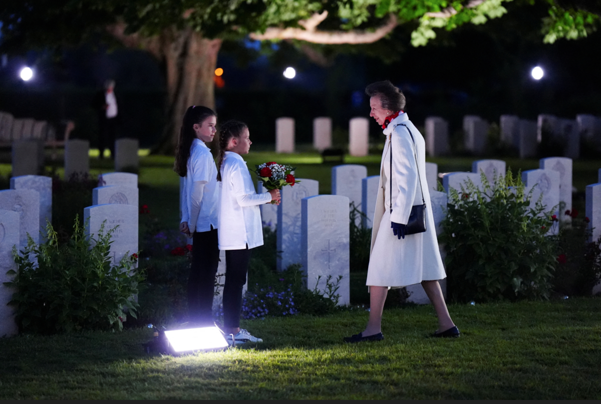 Britain's Anne, The Princess Royal, President of the Commonwealth War Graves Commission accepts a posy to lay on the Grave of an Unknown Soldier, during the Commonwealth War Graves Commission's Great Vigil