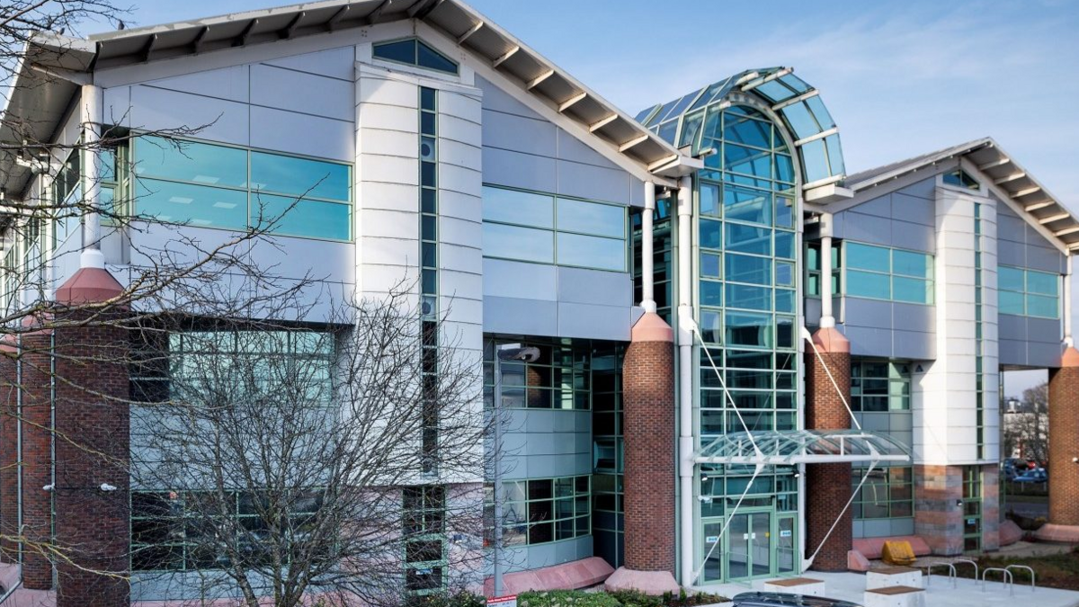 A modern glass building of where Reading's new police station will be in Whitley.