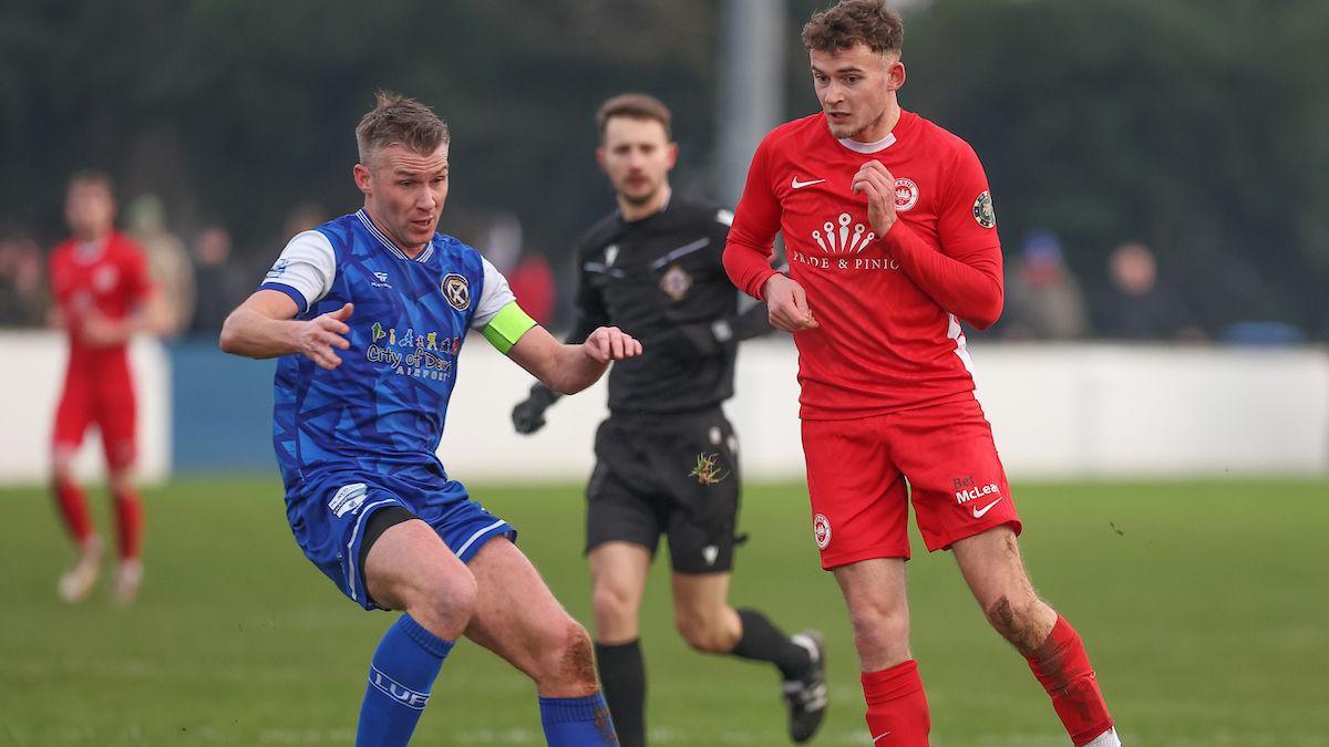 Stephen Lowry and Benji Magee in action